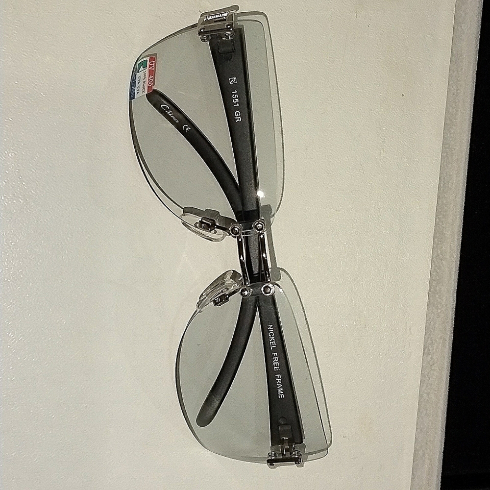 Sunglasses light tint all day ware . UV400 fashion eye ware
